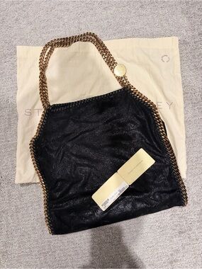 STELLA MCCARTNEY
Black Shaggy Deer Faux-Leather Small Falabella Tote Bag